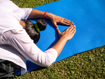 A women is doing Yoga